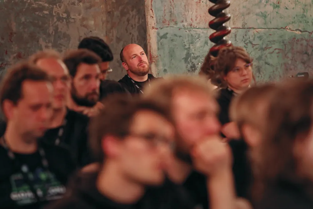 Jon listening to a talk