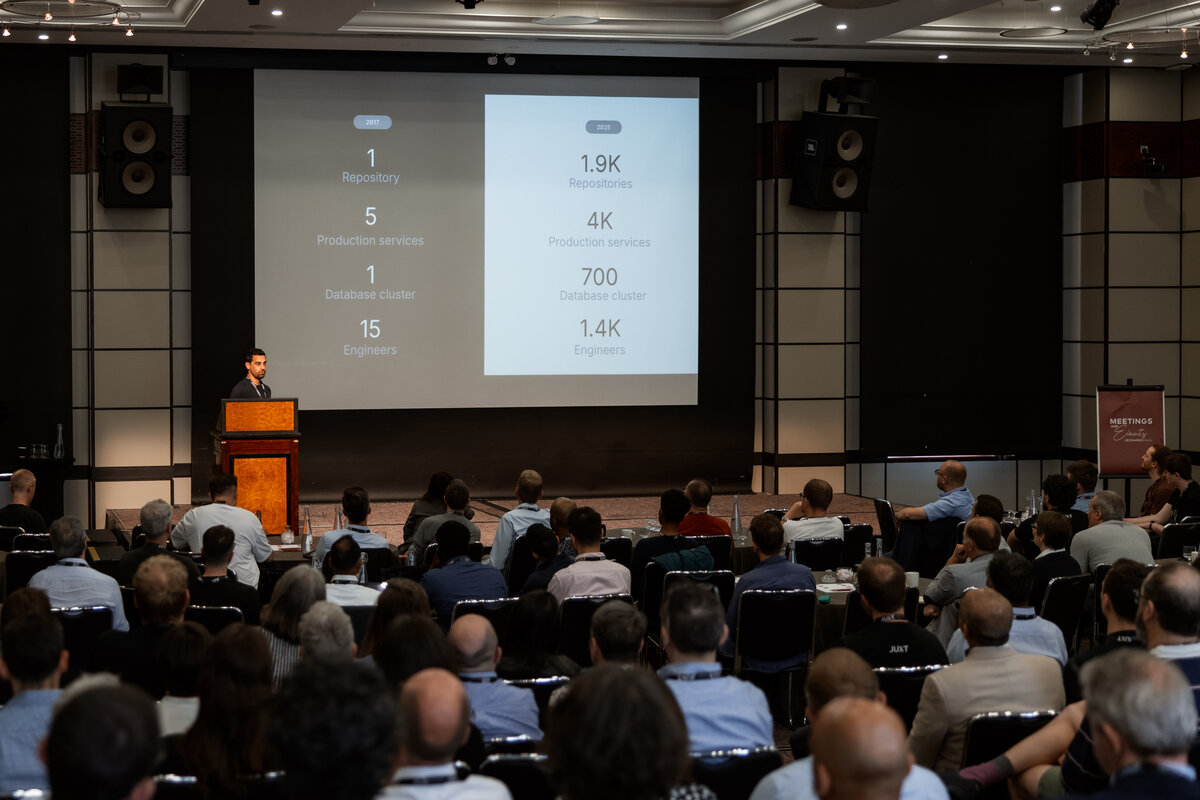 XT25 Conference - speaker presenting to packed audience